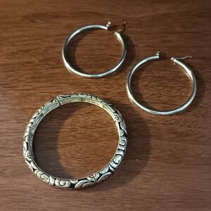 Large silver loop earrings and stretch bracelet